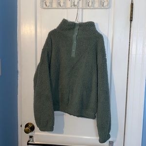 green fuzzy collared sweatshirt